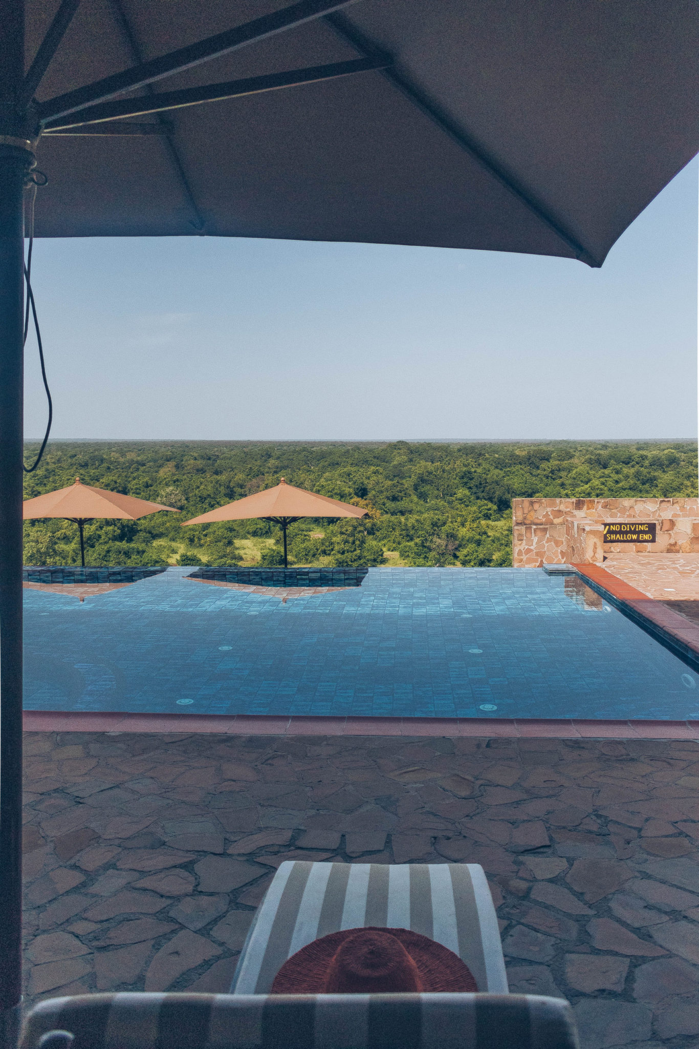 luxury safari resort in west africa_zaina lodge_pool side